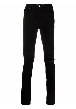 AMIRI distressed-finish slim-cut jeans - Black