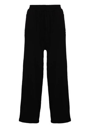 Undercover loose-fit wool track pants - Black