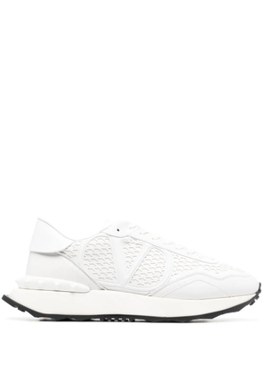 Valentino Garavani logo-embossed sneakers - White