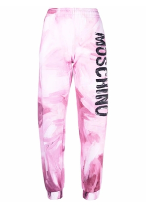 Moschino abstract-print branded track trousers - Pink