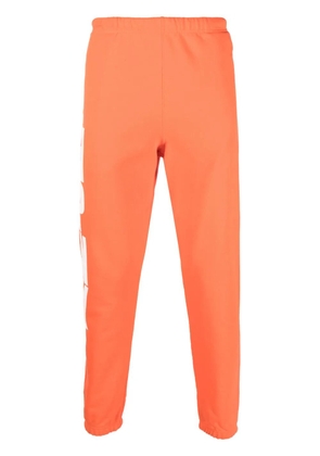 Heron Preston HPNY-print tapered track pants - Orange