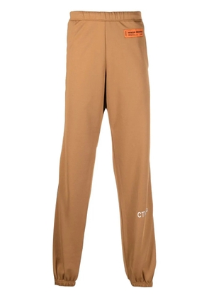 Heron Preston logo-patch track pants - Brown