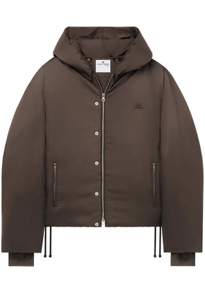 Courrèges logo-patch hooded puffer jacket - Brown