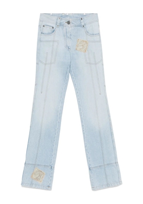 Christian Dior Pre-Owned 2000s patch-detail jeans - Blue