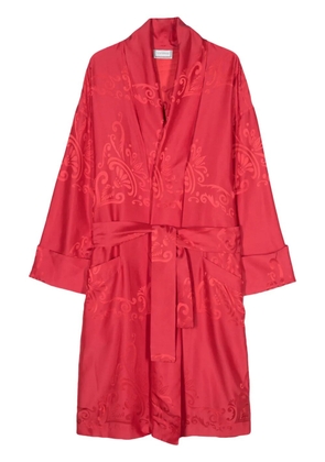 Versace Pre-Owned 1980s logo-jacquard bested coat - Red