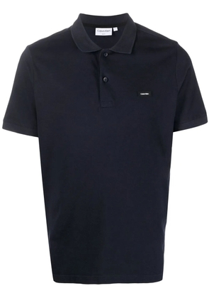 Calvin Klein logo-patch polo shirt - Blue