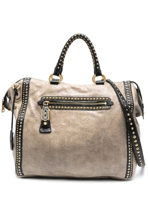 Prada Pre-Owned 2010s stud-embellished zipped two-way bag - Neutrals