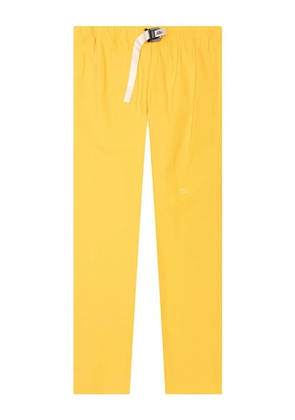 Advisory Board Crystals logo-patch trousers - Yellow