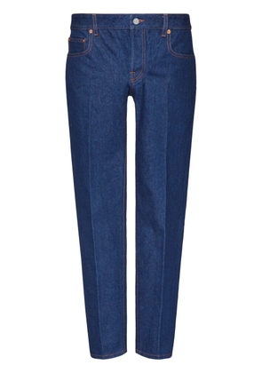 Valentino Garavani logo-appliqué tapered-leg jeans - Blue