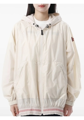 Moncler Grenoble embellished-hem raincoat - Neutrals