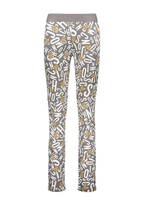 Moschino all-over print trousers - Grey