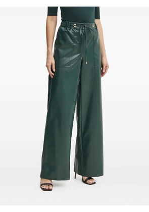 SIMONA CORSELLINI drawstring pocket trousers - Green