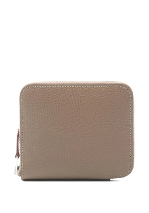 Hermès Pre-Owned 2024 zip-fastening leather wallet - Neutrals