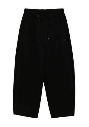 SONGZIO panther-embroidered trousers - Black