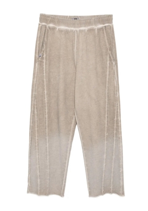 izzue faded-effect track pants - Grey