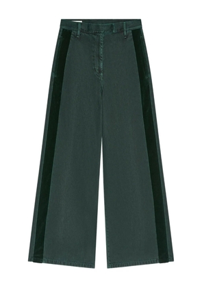 DRIES VAN NOTEN side-stripe denim trousers - Green