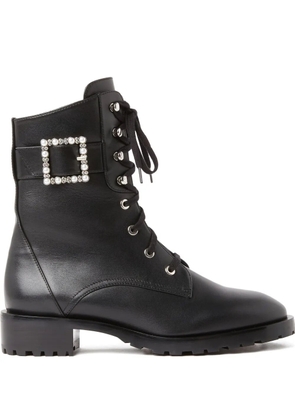 Stuart Weitzman pearl-embellished buckled combat boots - Black