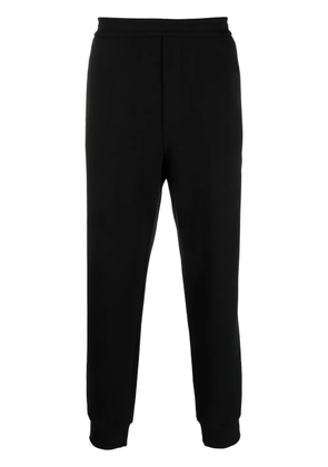 The Row tapered cotton track pants - Black