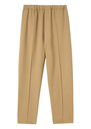 Jil Sander elasticated-waist tapered trousers - Brown