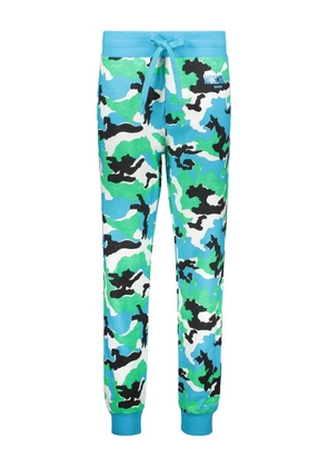 Moschino all-over print track pants - Blue