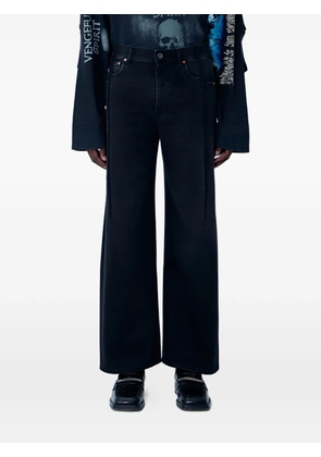 VETEMENTS five-pocket distressed-finish jeans - Black