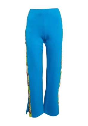 Off-White Pre-Owned logo-tape side-slit trousers - Blue