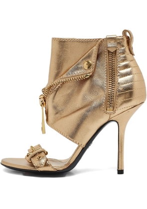 Moschino Pre-Owned 110mm decorative-zip sandals - Gold