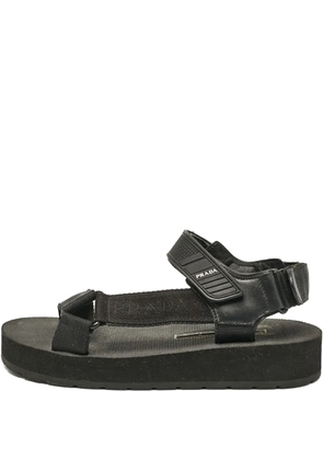 Prada Pre-Owned logo-print flat sandals - Black