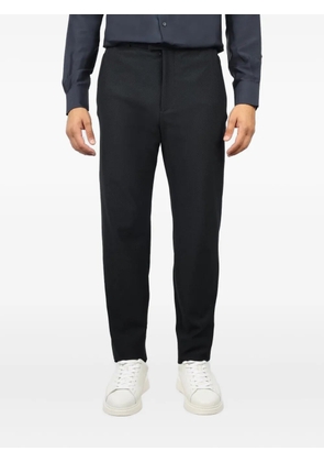 Emporio Armani micro-textured elastic trousers - Blue