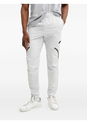 Under Armour panelled zip-pocket track pants - Neutrals