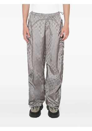 MISBHV monogram-patterned trousers - Grey