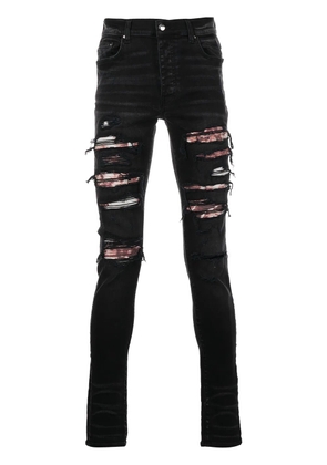 AMIRI ripped skinny jeans - Black