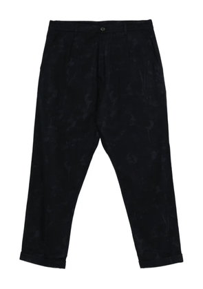 Universal Works floral-pattern trousers - Blue