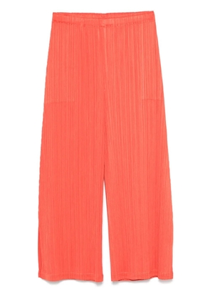 Pleats Please Issey Miyake pleated trousers - Orange