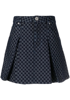 Balmain pleated monogram-jacquard denim miniskirt - Blue