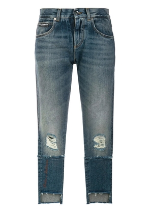 Dolce & Gabbana deconstructed logo patch jeans - Blue