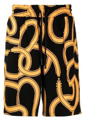 COUNTY OF MILAN Snakes print track shorts - Black