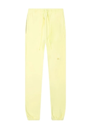 Advisory Board Crystals logo-patch track pants - Yellow