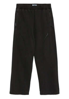 izzue Cold-dyed sweatpants - Black