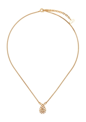 Christian Dior Pre-Owned 1990s CD pendant necklace - Gold