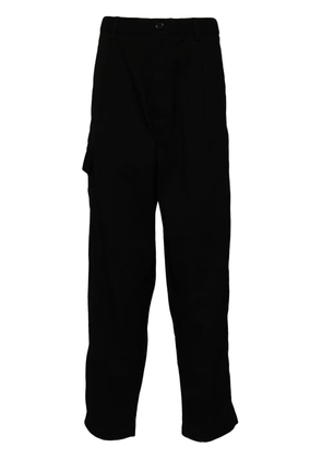 Undercover pockets tapered trousers - Black