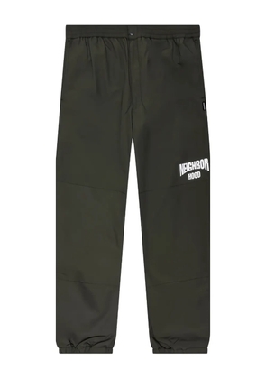 Neighborhood logo-print zip-detail trousers - Black