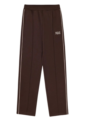 Sporty & Rich Action side-stripe track pants - Brown