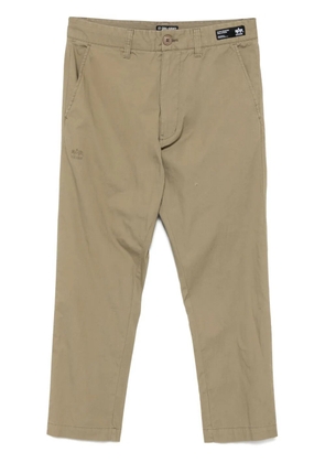 izzue logo-embroidered trousers - Neutrals
