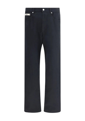 Moschino logo-plaque trousers - Black