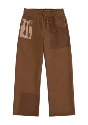 KidSuper sun faded sweats trousers - Brown