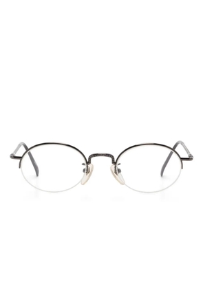 Jean Paul Gaultier Pre-Owned oval-frame glasses - Brown