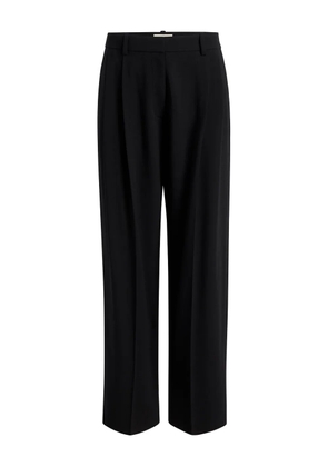 KHAITE belt-loops pleated trousers - Black