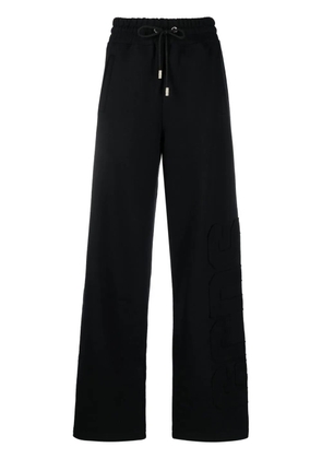 GCDS appliqué logo track pants - Black