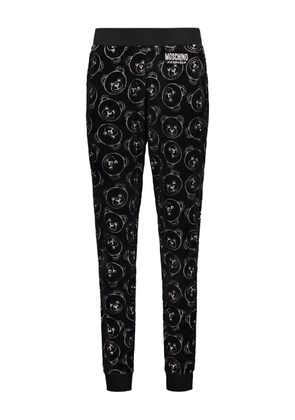 Moschino all-over print trousers - Black